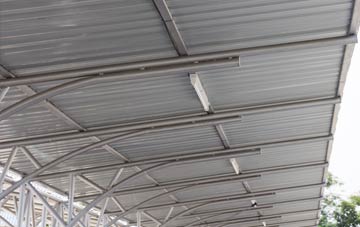 installing Pitney metal roofing